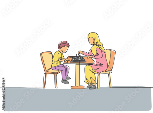 One single line drawing of young Arabian mother teach her son to play chess seriously at home vector illustration. Happy Islamic muslim family parenting concept. Modern continuous line draw design