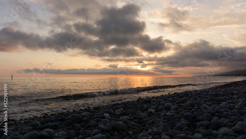 Amazing beach sunset over Black Sea. Lazarevskoye  Sochi  Russia
