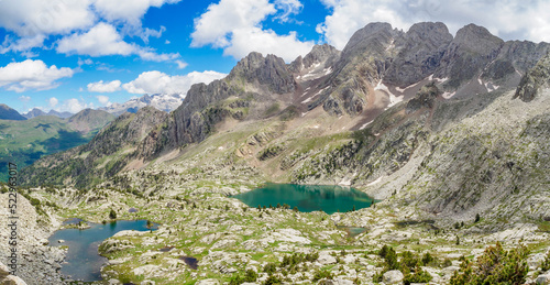 Perramo lake and peaks at baclground in Benasque Valley, Spain photo