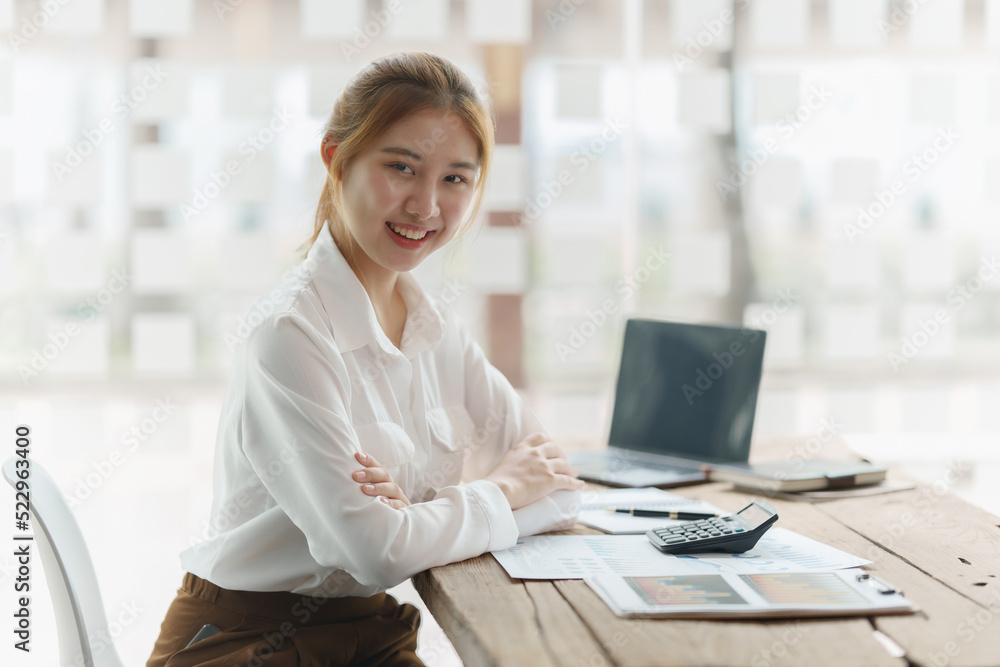 Beautiful young asian business woman at office Stock Photo | Adobe Stock