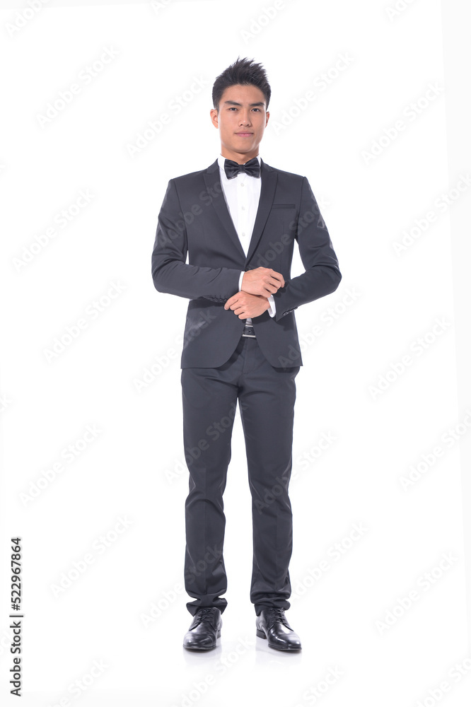 Handsome young business man
wear formal suit with black tie, Businessman portrait Isolated on white background
Handsome young business man
wear formal suit with black tie, Businessman portrait Isolated on white background