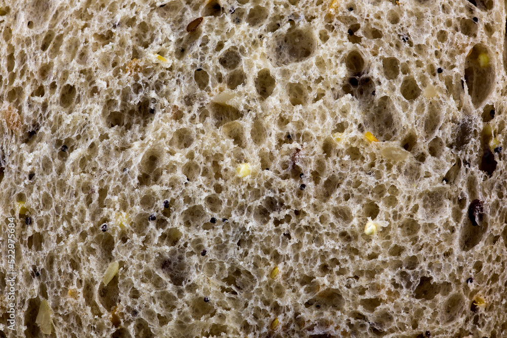Closeup View of Slice of Seeded Wholegrain Bread Closeup View of Slice of Seeded Wholegrain Bread