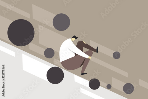 Illustration of a person moving down along with falling metal spheres