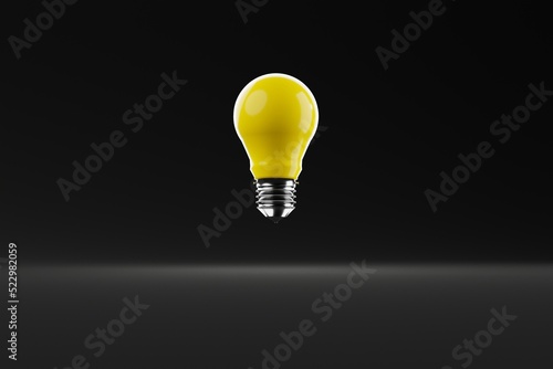 Yellow light bulb over a dark background. The concept of the formation of ideas, creativity, problem solving. Idea and creativity. 3d render