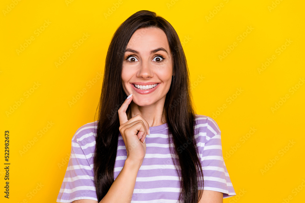 Closeup photo of young attractive woman surprised unexpected sale good mood isolated on yellow color background Closeup photo of young attractive woman surprised unexpected sale good mood isolated on yellow color background