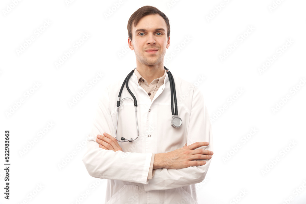 Portrait of handsome doctor in white medical coat with stethoscope on white background with copy space Portrait of handsome doctor in white medical coat with stethoscope on white background with copy space