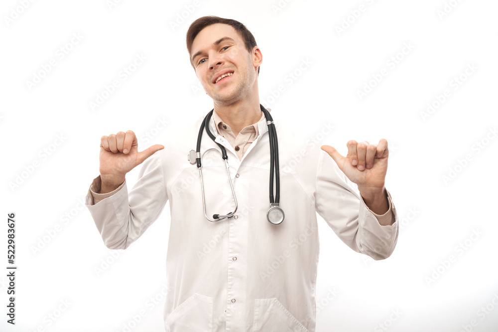 Portrait of happy doctor in white medical coat showing gesture all is well isolated on white background with copy space