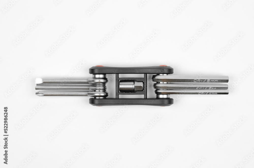 Multitool key for bicycle isolated on white background