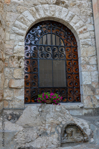 old window, Church of All Nations on the Mount of Olives in Jerusalem, Israel
