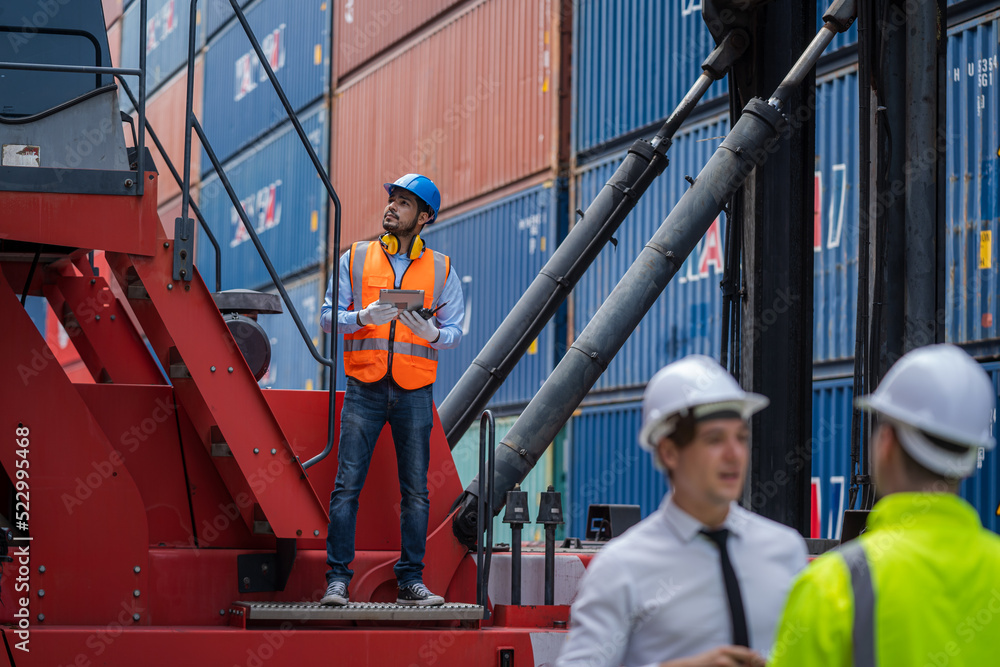 Engineer container cargo working and checking stock into container for loading.logistic transport and business industry export. Engineer container cargo working and checking stock into container for loading.logistic transport and business industry export.
