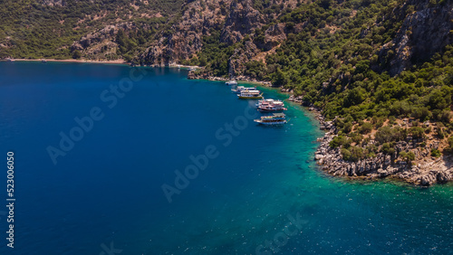 Fototapeta Naklejka Na Ścianę i Meble -  Beautiful view of the Aegean coast. Beautiful colorful sea. Beautiful water. Road along the sea. Beautiful nature. Sunny day.