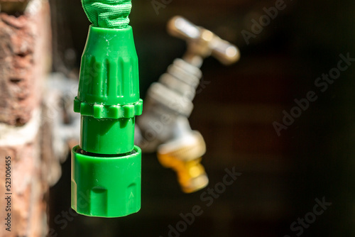 A disconnected hosepipe during a drought in the UK photo