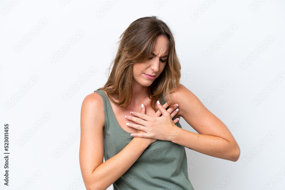 Young caucasian woman isolated on white background having a pain in the heart Young caucasian woman isolated on white background having a pain in the heart