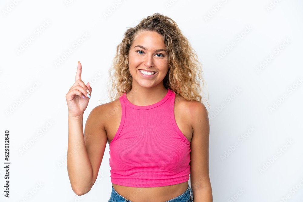 Girl with curly hair isolated on white background pointing up a great idea Girl with curly hair isolated on white background pointing up a great idea