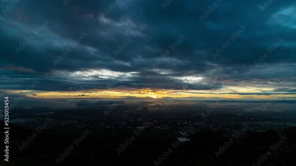 Cloudy timelapse 4k video and morning sunrise with views overlooking the building. Cloudy timelapse 4k video and morning sunrise with views overlooking the building.