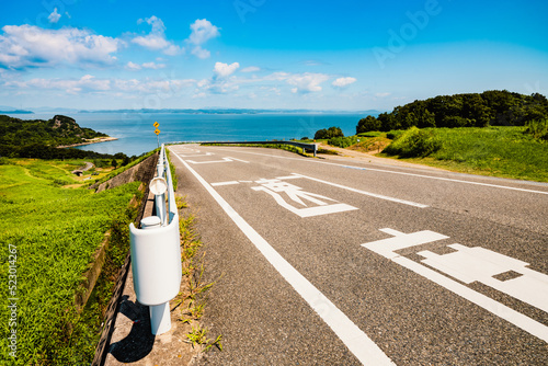 Beautiful view of a slope way near the sea or ocean in summer, Karato in Teshima Island in Kagawa Prefecture in Japan, Travel or outdoor Background	 photo