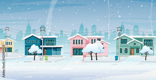 A house in a community with snow in the city.