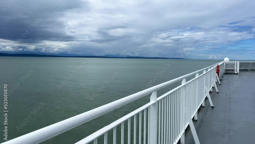 the view from the deck of the covering ship to the sea or ocean is visible Horizon clear blue color of water and sky can be used as a background For title text or advertising calm rest and relaxation the view from the deck of the covering ship to the sea or ocean is visible Horizon clear blue color of water and sky can be used as a background For title text or advertising calm rest and relaxation