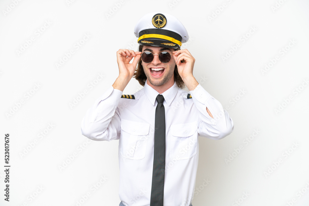 handsome Airplane pilot isolated on white background with glasses and surprised handsome Airplane pilot isolated on white background with glasses and surprised