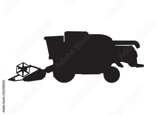 Black silhouette of a harvester at harvest in isolate on a white background.Side view.Wheat harvesting process.