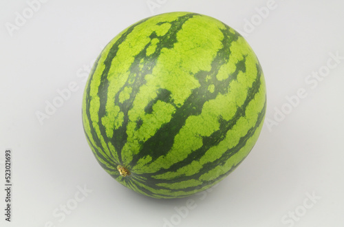 Watermelon on gray background close up