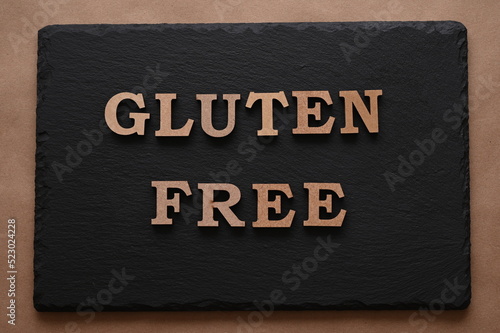 The letters Gluten free on a black background