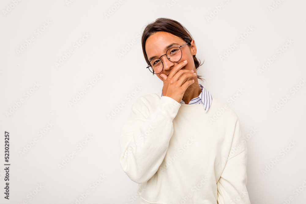 Young hispanic woman isolated on white background laughing happy, carefree, natural emotion. Young hispanic woman isolated on white background laughing happy, carefree, natural emotion.