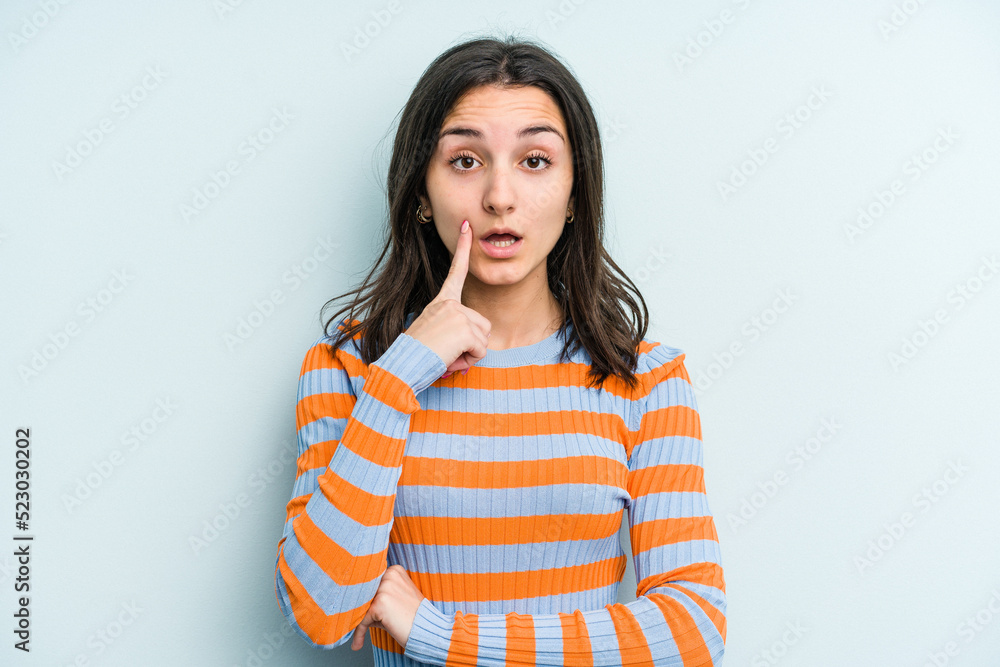 Young caucasian woman isolated on blue background having some great idea, concept of creativity. Young caucasian woman isolated on blue background having some great idea, concept of creativity.