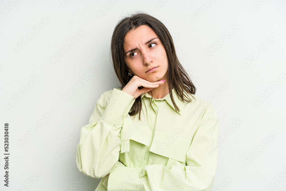 Young caucasian woman isolated on white background tired of a repetitive task. Young caucasian woman isolated on white background tired of a repetitive task.