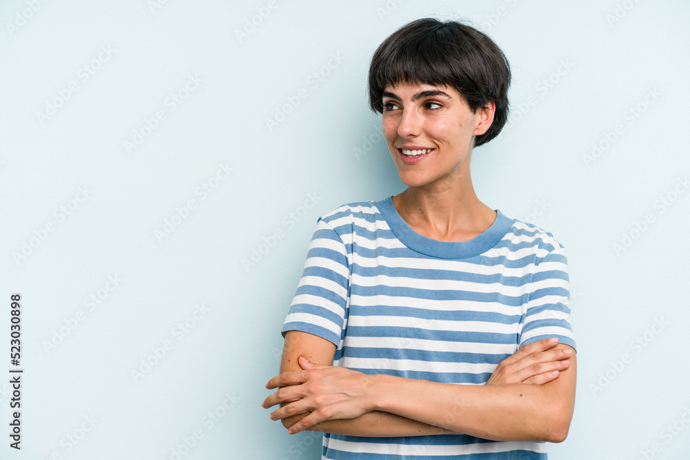 Young caucasian woman with a short hair cut isolated smiling confident with crossed arms. Young caucasian woman with a short hair cut isolated smiling confident with crossed arms.