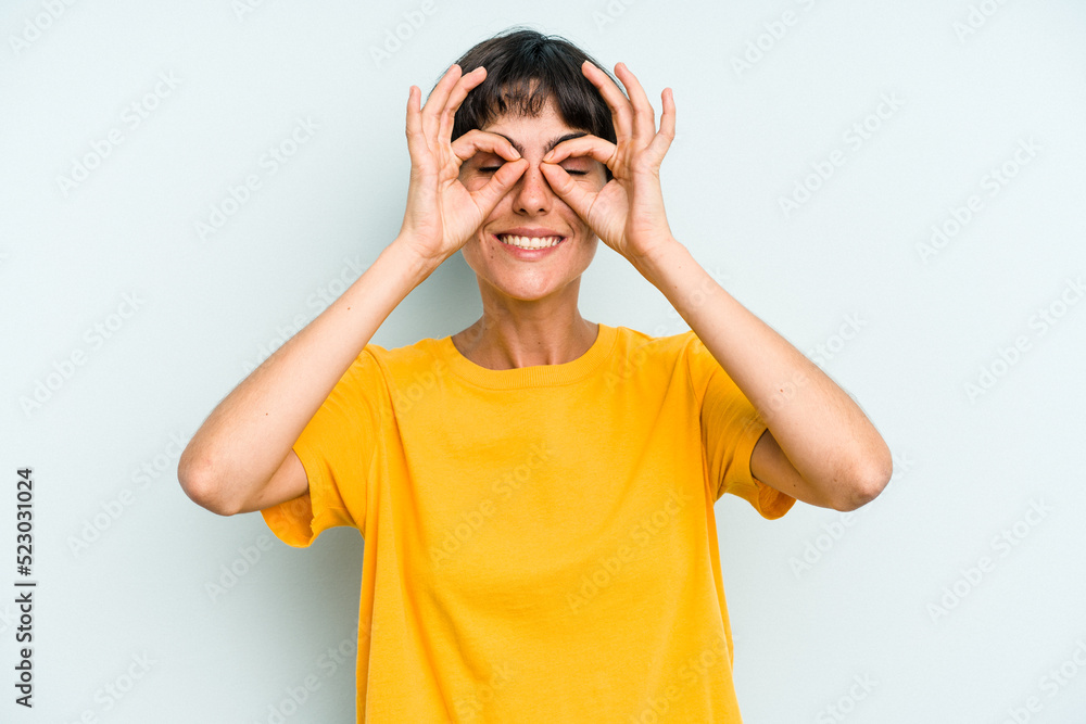 Young caucasian woman with a short hair cut isolated excited keeping ok gesture on eye. Young caucasian woman with a short hair cut isolated excited keeping ok gesture on eye.
