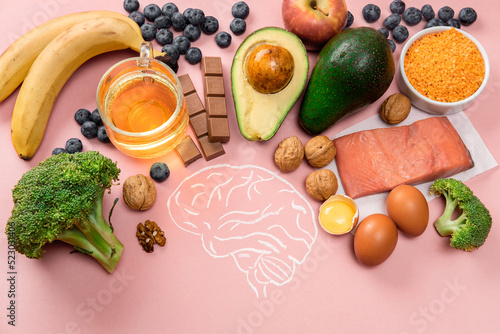 Best foods for brain and memory on pink background. Food for mind and charge of energy. Healthy lifestyle. Copy space. Top view