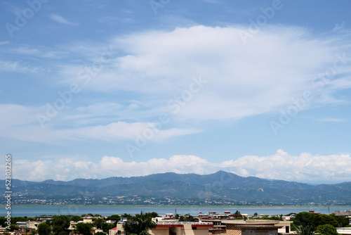 Beautiful Mountains behind the city and river, Skyline view shot © Zaraq