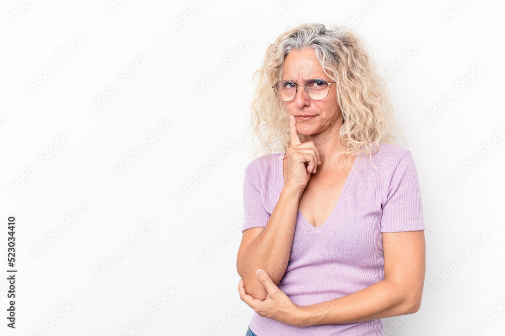 Middle age caucasian woman isolated on white background looking sideways with doubtful and skeptical expression. Middle age caucasian woman isolated on white background looking sideways with doubtful and skeptical expression.