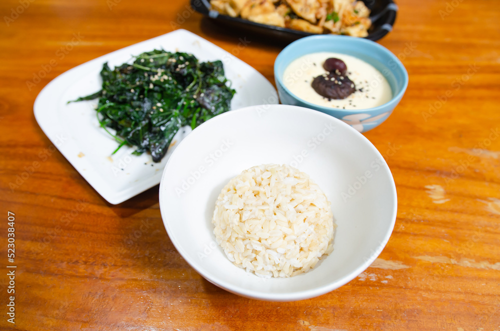 Simple vegetarian dish with eggs, tofu and sauteed vegetables. Simple vegetarian dish with eggs, tofu and sauteed vegetables.