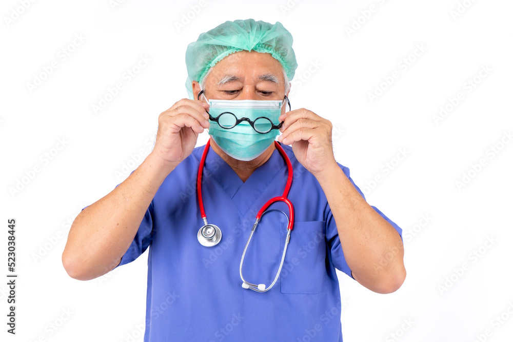 portrait of medical doctor in uniform, asian doctor elderly man wear a mask with stethoscope on white background. portrait of medical doctor in uniform, asian doctor elderly man wear a mask with stethoscope on white background.