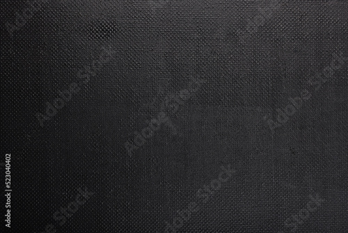 Fotografie black rough plastic surface with regular artificial pimply bumps - full frame ba