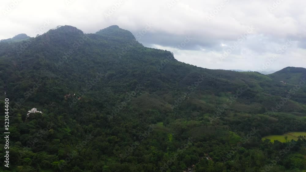 Top view of Mountain slopes with rainforest and agricultural land of farmers. Sri Lanka. Top view of Mountain slopes with rainforest and agricultural land of farmers. Sri Lanka.