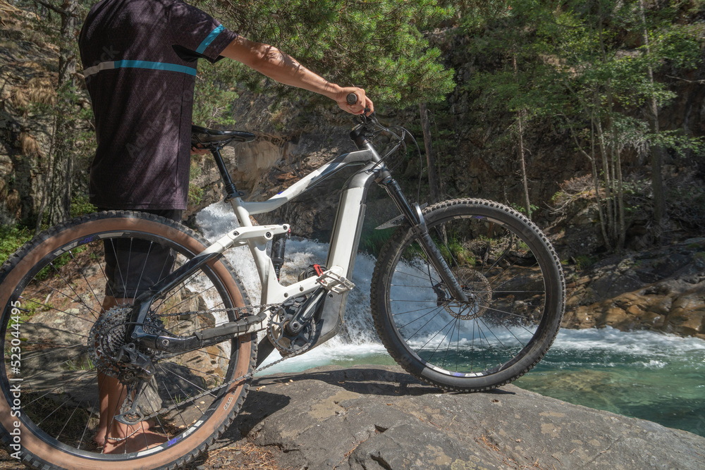 Fototapeta premium person with electric bike in nature