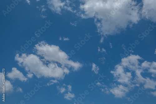 white clouds in the blue sky. cumulus.