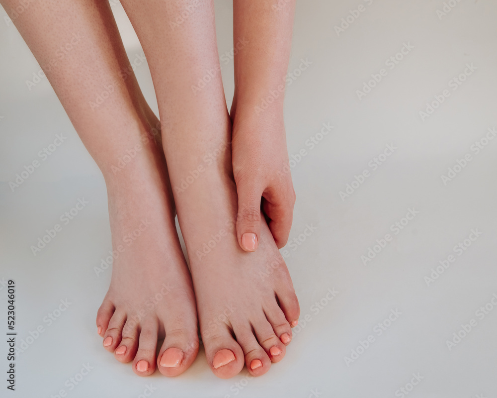 female legs on white background female legs on white background