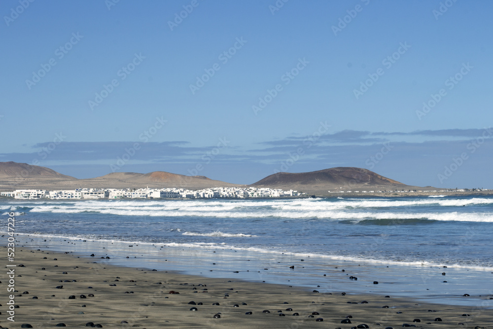 Famara Beach, surfing beach in Lanzarote, Canary Islands, Spain Famara Beach, surfing beach in Lanzarote, Canary Islands, Spain