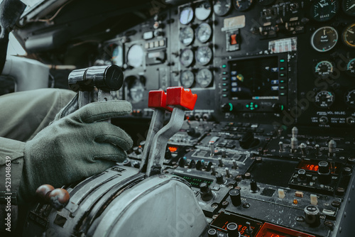 Selective focus inside classic cockpit when pilot operate airplane ,aircraft panel use analog flight instrument display