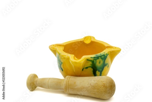 Mortar, utensil composed of a concave container and a 'maja', to grind or crush food or condiments. photo