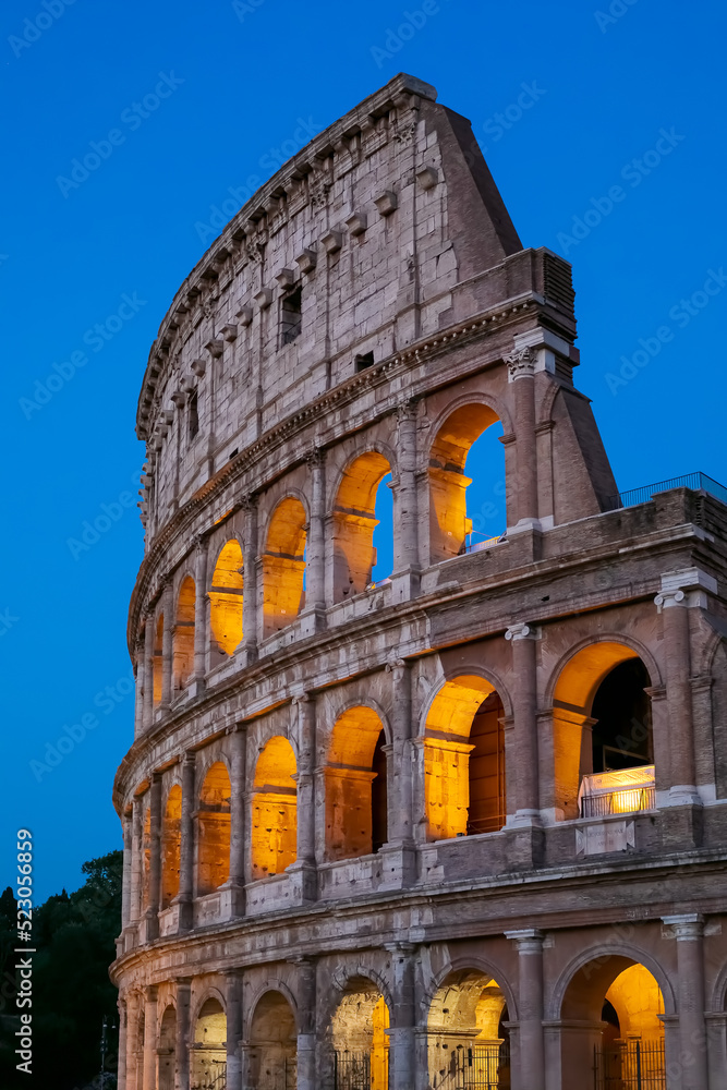 Colosseum illuminated in the evening.