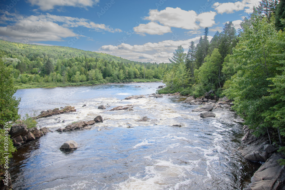Waterfalls on a beautiful wild river in Quebec in Canada Waterfalls on a beautiful wild river in Quebec in Canada