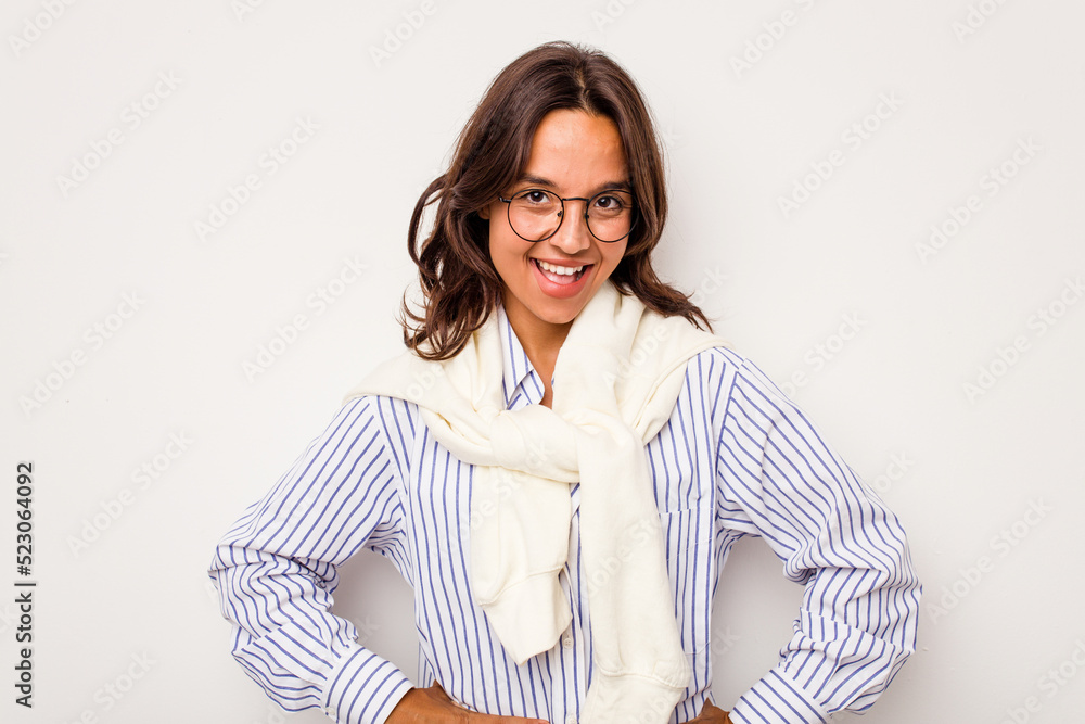 Young hispanic woman isolated on white background happy, smiling and cheerful. Young hispanic woman isolated on white background happy, smiling and cheerful.