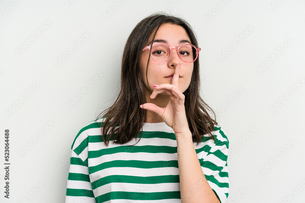 Young caucasian woman wearing a glasses isolated on blue background keeping a secret or asking for silence. Young caucasian woman wearing a glasses isolated on blue background keeping a secret or asking for silence.
