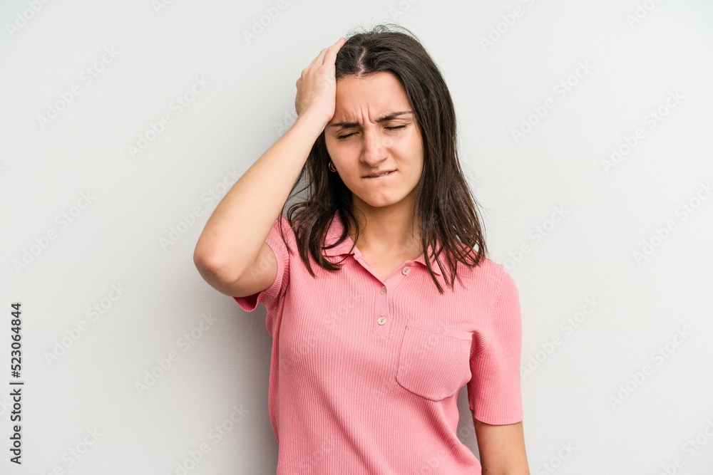 Young caucasian woman isolated on white background forgetting something, slapping forehead with palm and closing eyes. Young caucasian woman isolated on white background forgetting something, slapping forehead with palm and closing eyes.