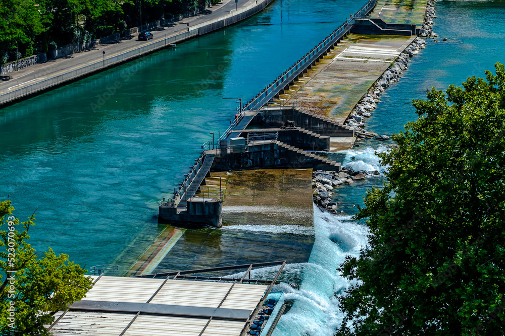 Floodgates or flood locks on the river Aare in Bern, Switzerland to regulate the water flow. Floodgates or flood locks on the river Aare in Bern, Switzerland to regulate the water flow.